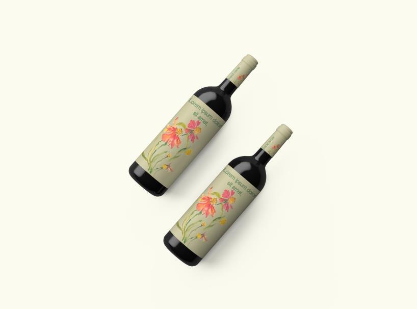 Two wine bottles with red botanical labels